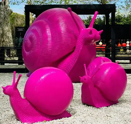 Giant pink snail sculptures at Matakana Sculpture Trail